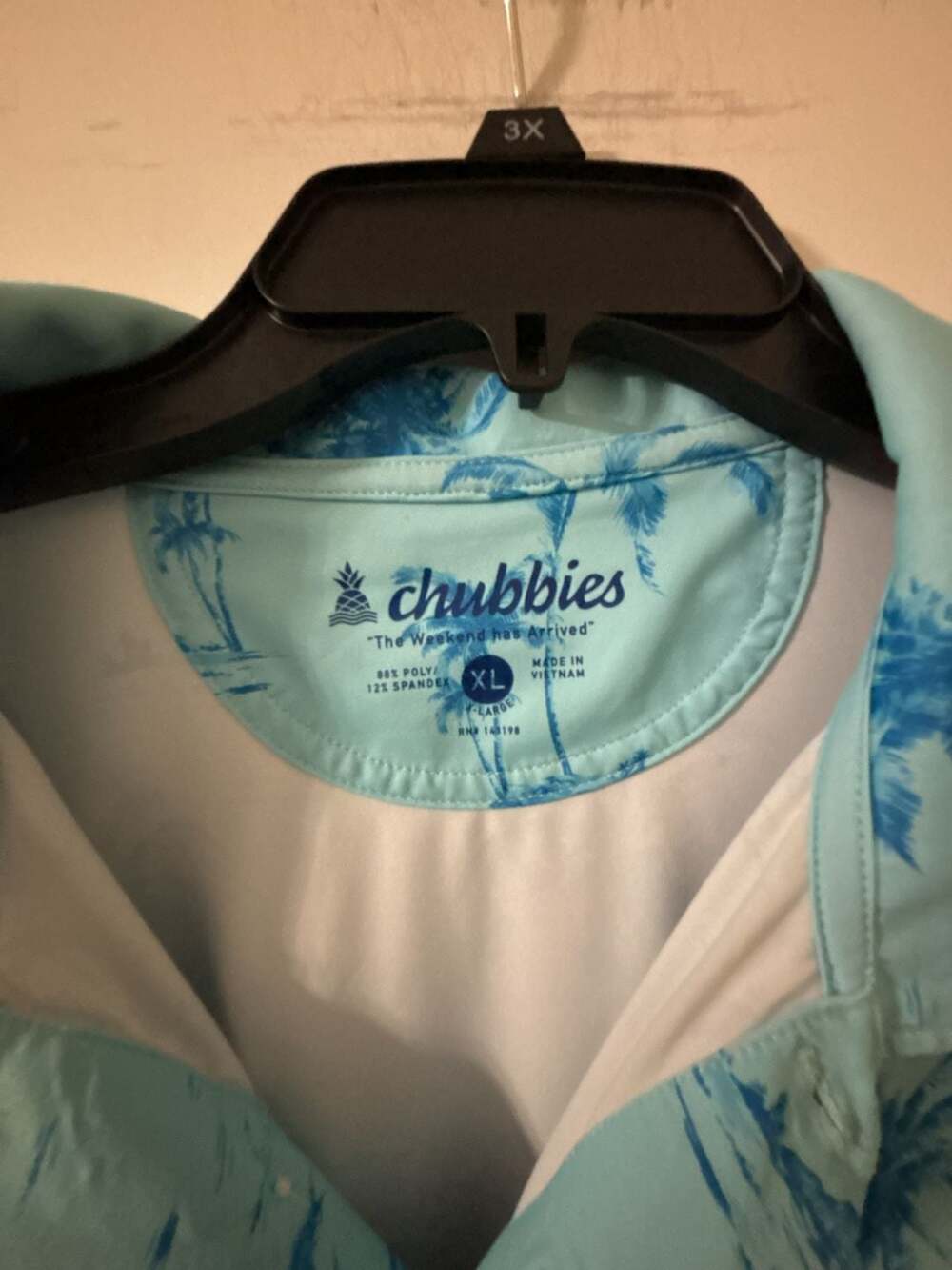Chubbies Mens Performance Polo Shirt Light Blue Tropical Palm Tree Print